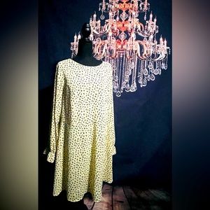 Pale yellow dress with black flowers